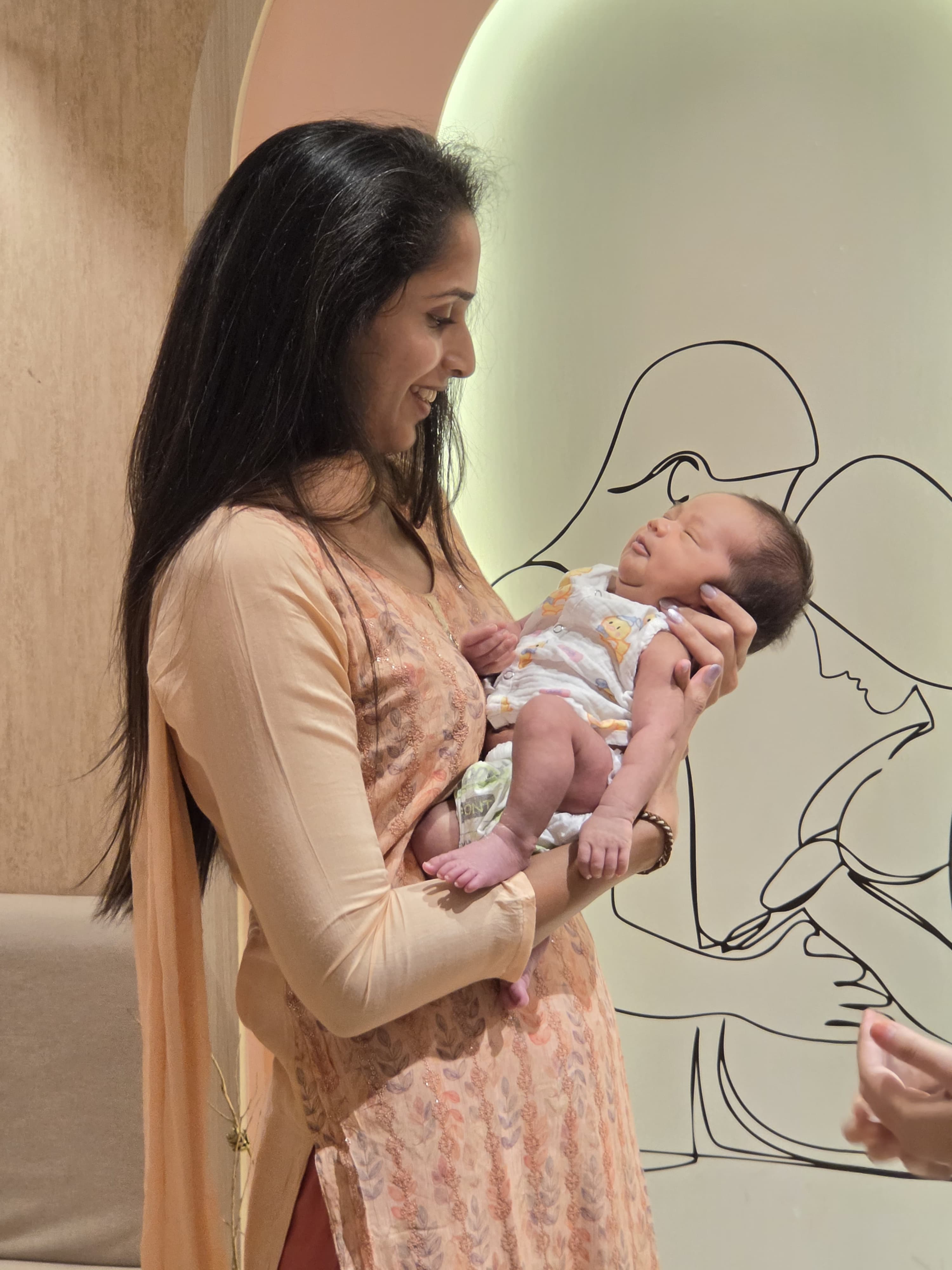 Dr. Santoshi Nandigam with a newborn at BirthWave